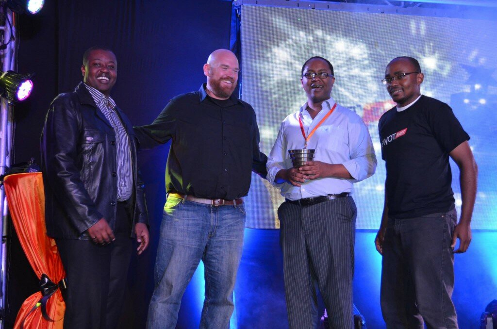 Erik Hersman and Ken Mwenda awarding Go Finance from Tanzania the overall winner of PIVOT East 2013
